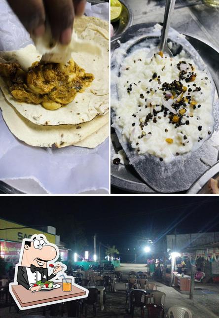 This is the photo showing food and interior at KANCHUMATI DHABA HOTEL