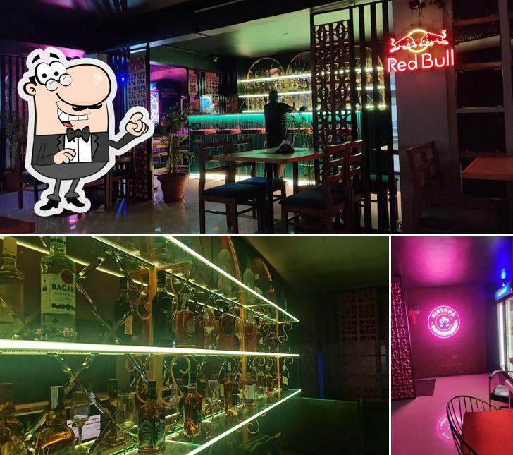 Take a seat at one of the tables at Nirvana Bar and Restaurant