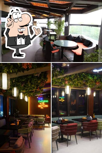 Take a seat at one of the tables at Liquid Lounge