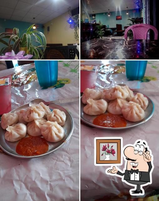 The photo of interior and food at Kabita restaurant and cafe