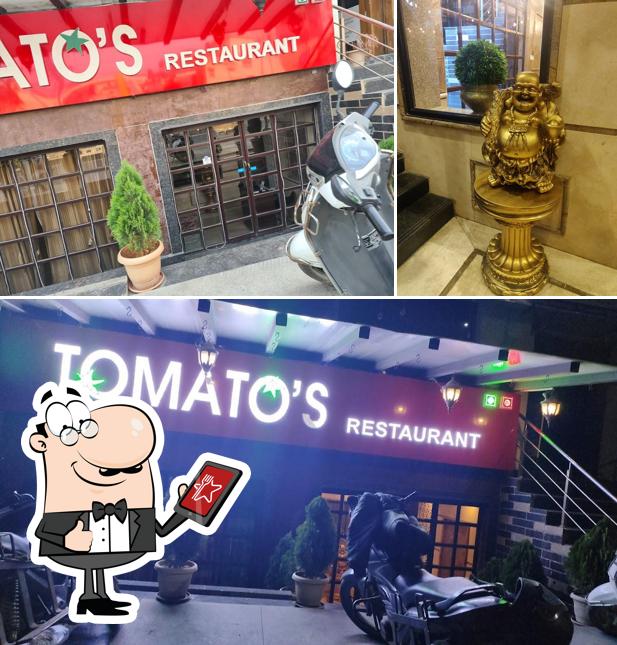 The exterior of Tomatoes Restaurant