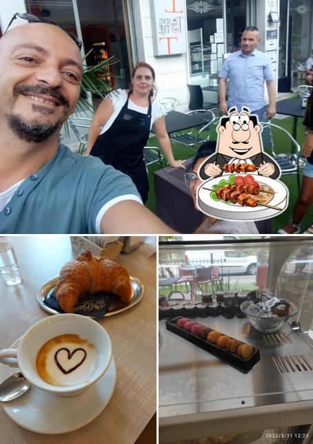 Tra le varie cose da BAR CAFFETTERIA T 23 si possono trovare la cibo e interni