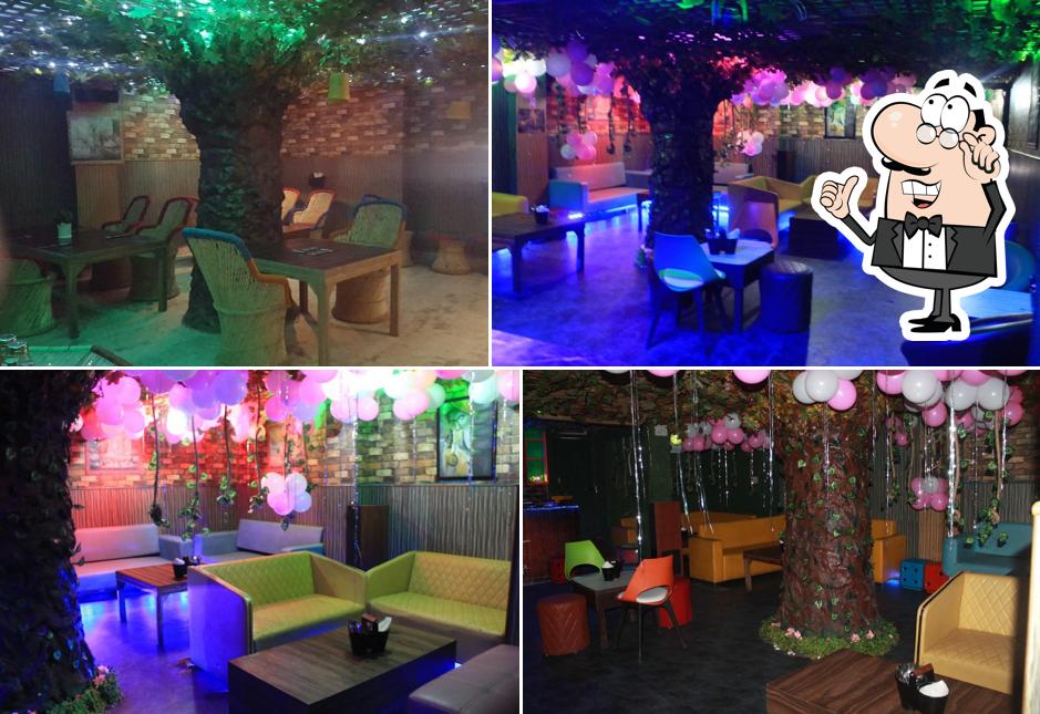 Take a seat at one of the tables at The Hide Out Cafe & Lounge