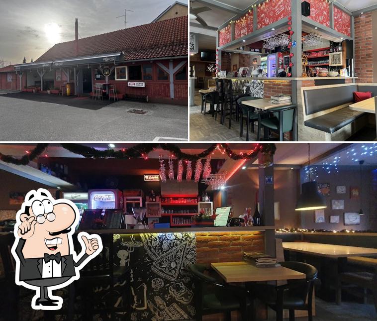 Dai un'occhiata agli interni di Pizza house Raj