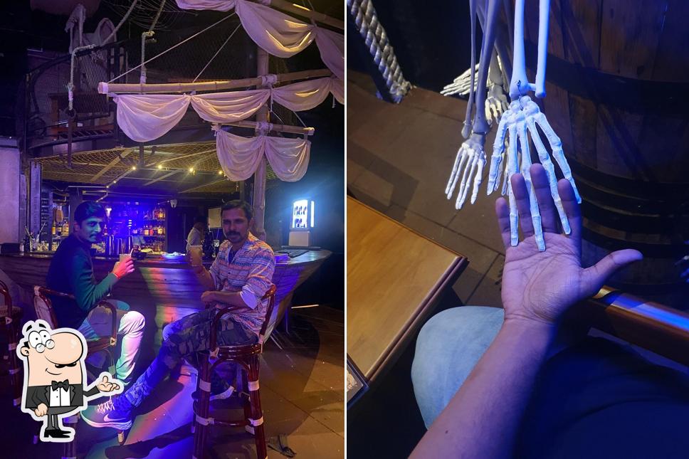 Take a seat at one of the tables at Pirates Bar & Kitchen