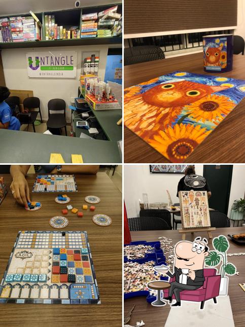 Take a seat at one of the tables at Untangle T Nagar - House of Puzzles & Board Games