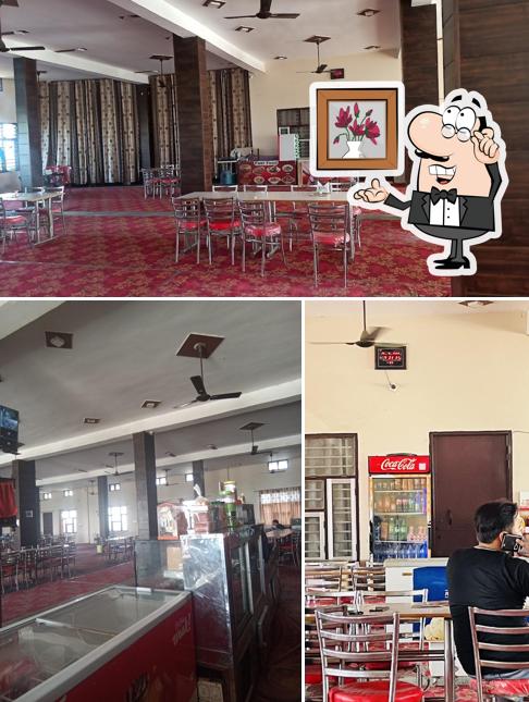 The interior of Saini Deluxe Vaishno Dhaba , Rooms