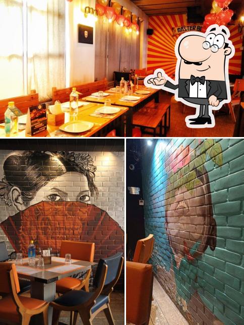 Take a seat at one of the tables at Holy Chopsticks