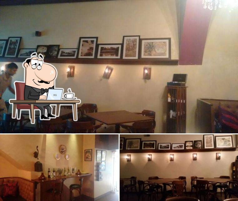 Take a seat at one of the tables at Cafe Nomad