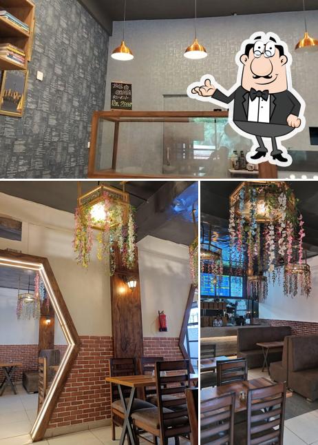 Take a seat at one of the tables at Licker's - Your Ultimate Pizza and Chinese Restaurant