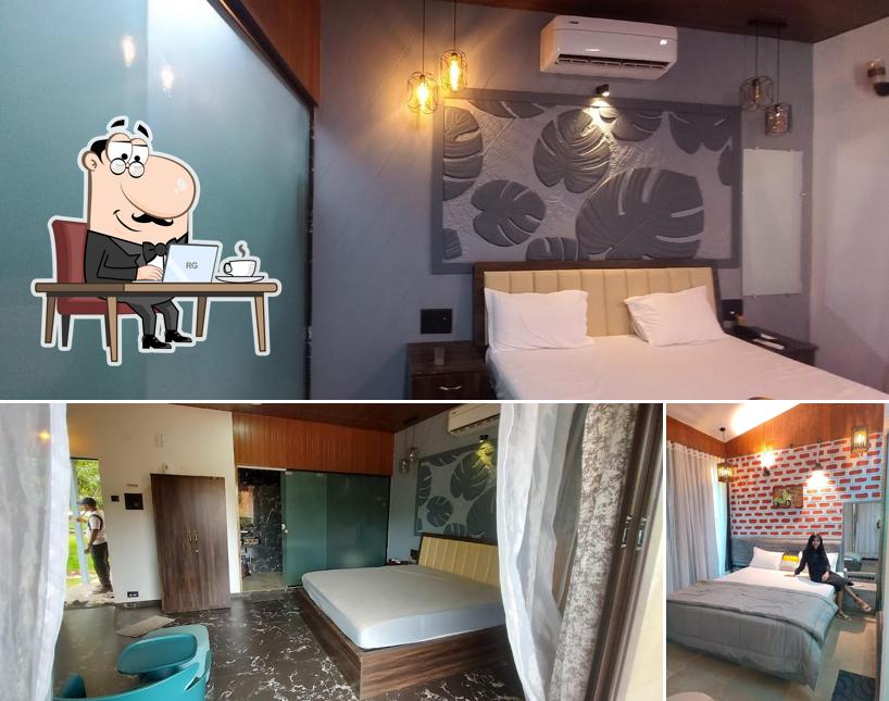 Take a seat at one of the tables at TATVARAJ FARMS, tambadi,Kolad