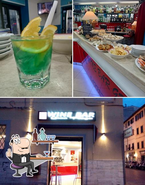 La foto della interni e bevanda di Wine Bar Gran Plaza