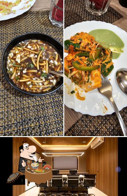 This is the photo displaying food and interior at La Festiva Restaurant Cafe Ganesh Banquet