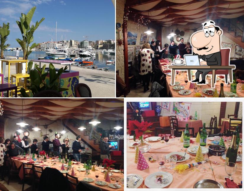 Gli interni di Osteria Del Porto Juan Les Pins