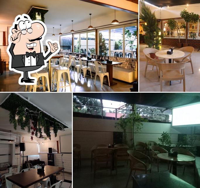 Take a seat at one of the tables at WYNKK Kitchen & Bar