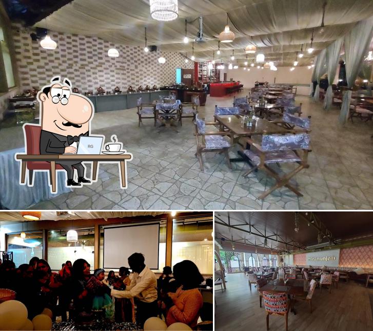 Take a seat at one of the tables at Mini Punjab Thane