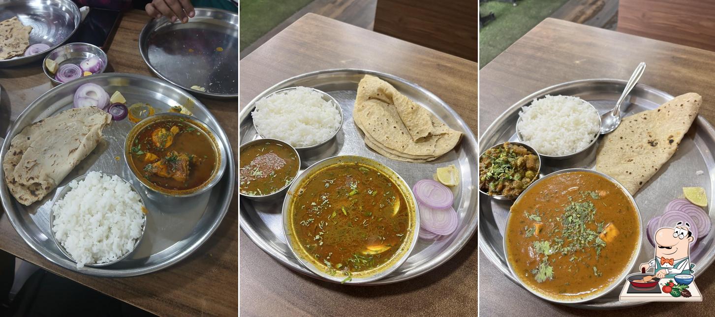 Chicken curry at Bomble's Veg and Non-Veg Thali restaurant