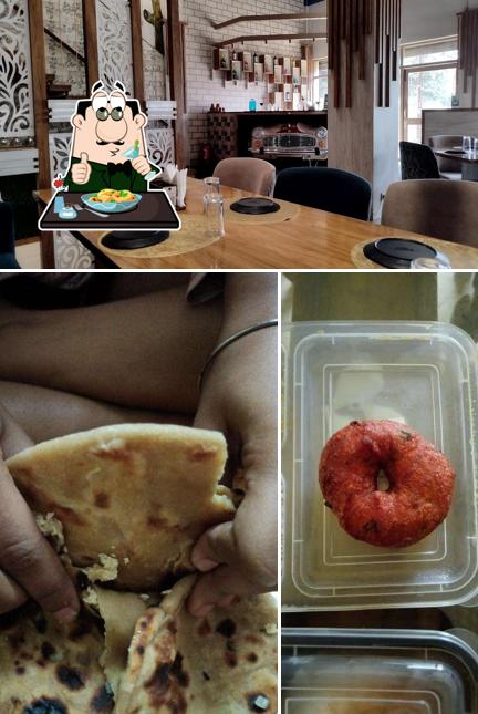 Check out the image displaying food and interior at Grains Veg Restaurant