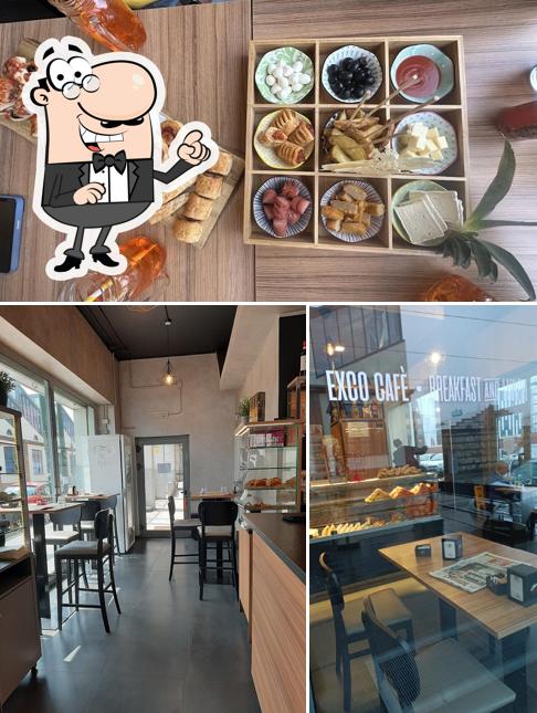 Guarda la foto che mostra la interni e cibo di Exco Cafe