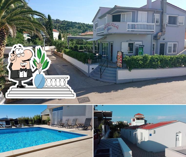 Puoi goderti l'aria fresca da seduto all'esterno di Vile Dalmacija