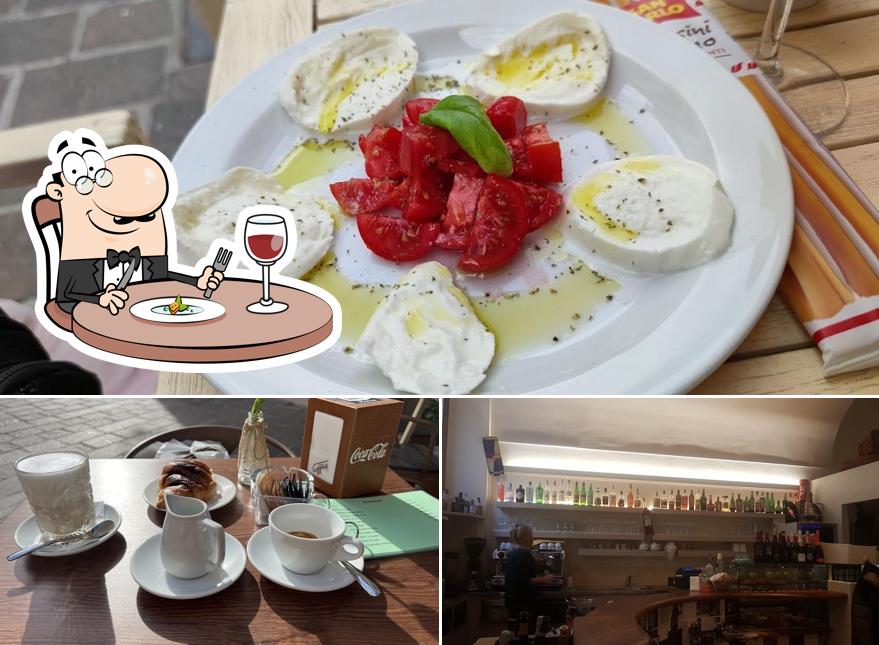 La immagine di cibo e bancone da bar da Dom Café