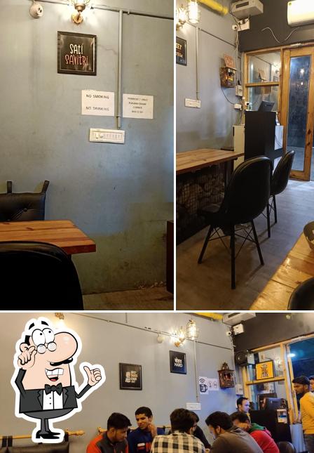 Take a seat at one of the tables at PUNJABI CHAAP CORNER