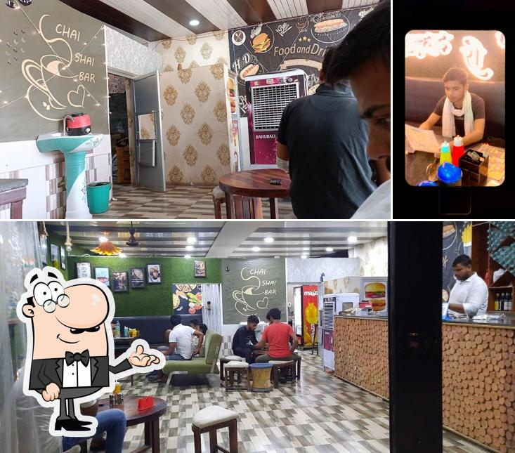 Take a seat at one of the tables at CHAI SHAI Bar, Lalganj Ajhara