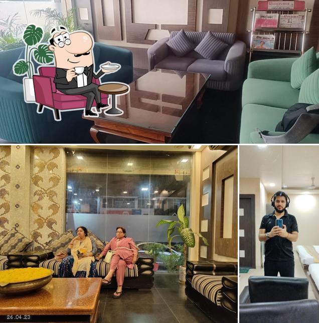 Take a seat at one of the tables at Hotel Rameshwaram