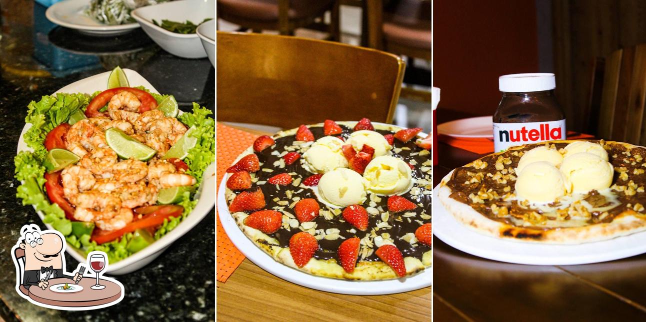 Comida em Gusteaus pizzaria