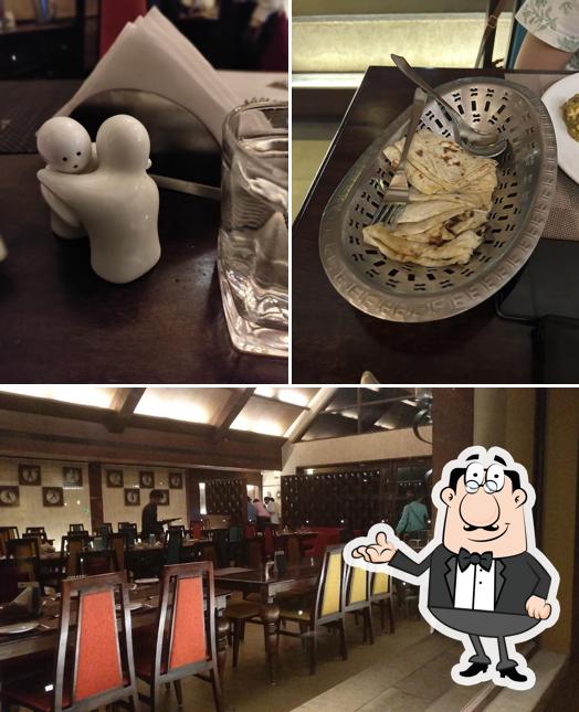 This is the photo depicting interior and beverage at Aquenos Restaurant Nadiad