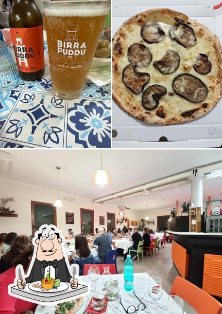 La foto della cibo e tavolo da pranzo di Pizzeria Da Sergio