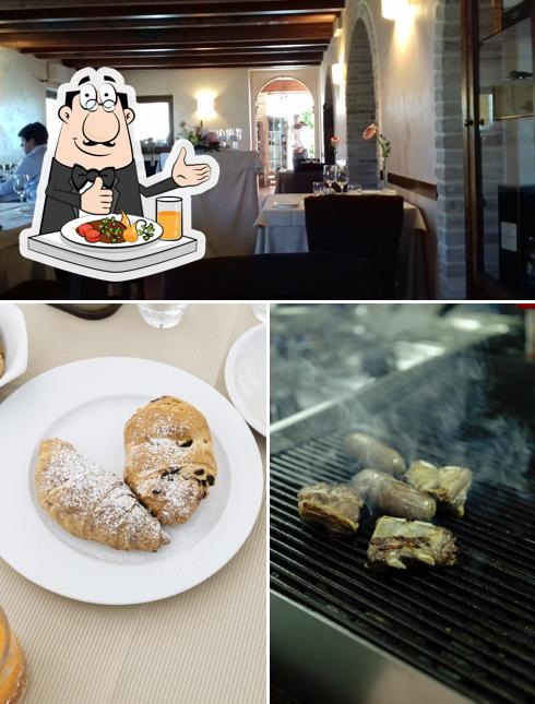 Tra le varie cose da Osteria dei Segreti Spa Resort si possono trovare la cibo e interni