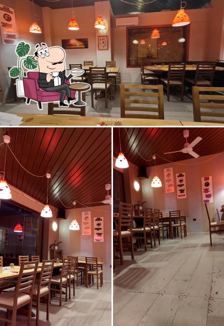 Dai un'occhiata agli interni di Pizzeria Il Corsaro