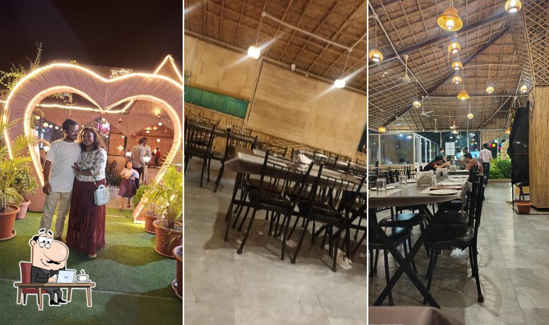 Take a seat at one of the tables at Aamantran Garden Restaurant