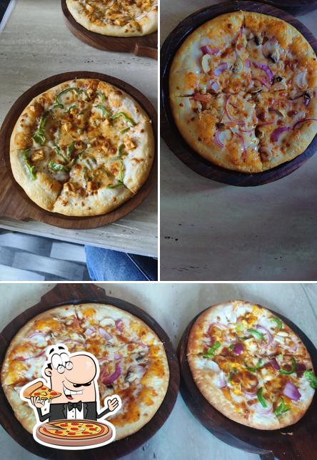 At Dream Pizza Cafe, you can try pizza