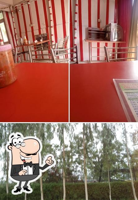 The photo of Punjabi Dhaba’s interior and exterior