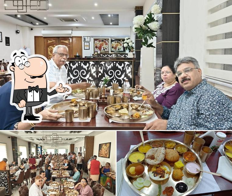 Take a seat at one of the tables at Shree Shivay Thali Dining Varanasi