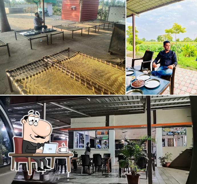 Take a seat at one of the tables at Hotel Vatika Dhaba