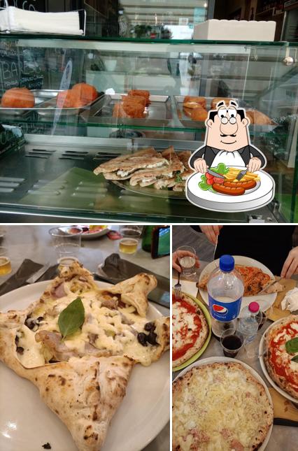 Tra le diverse cose da Pizzeria Prezzemolo si possono trovare la cibo e interni