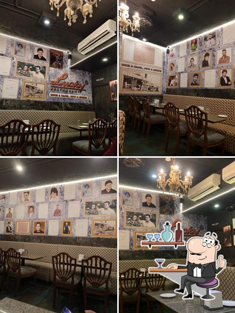 Take a seat at one of the tables at Lucky Restaurant Thane
