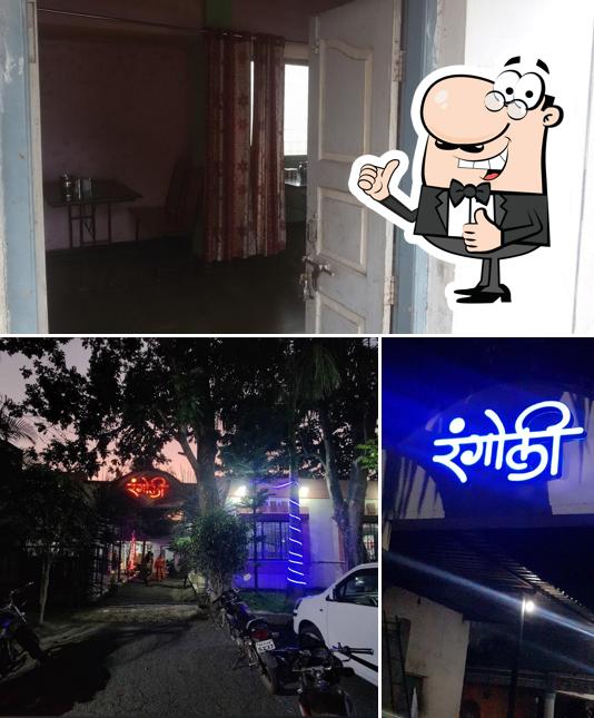Look at the image of Hotel Rangoli