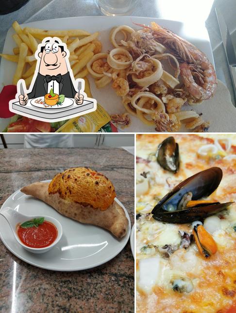 Ristorante Pizzeria L'Aroma si caratterizza per la cibo e bevanda