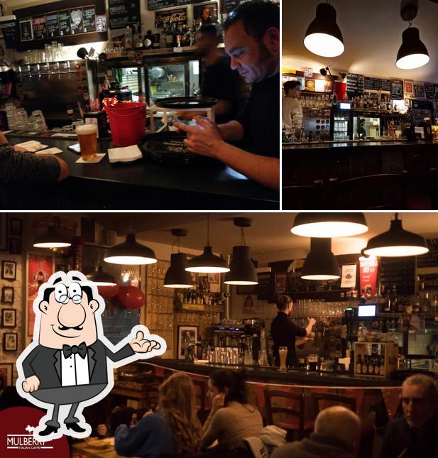 Dai un'occhiata agli interni di Mulberry St Italian Caffè