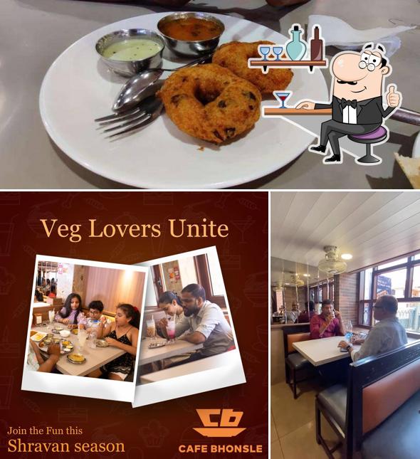 This is the image showing interior and food at Cafe Bhonsle