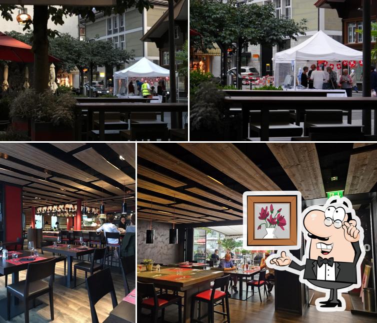 Dai un'occhiata agli interni di OX Restaurant & Grill