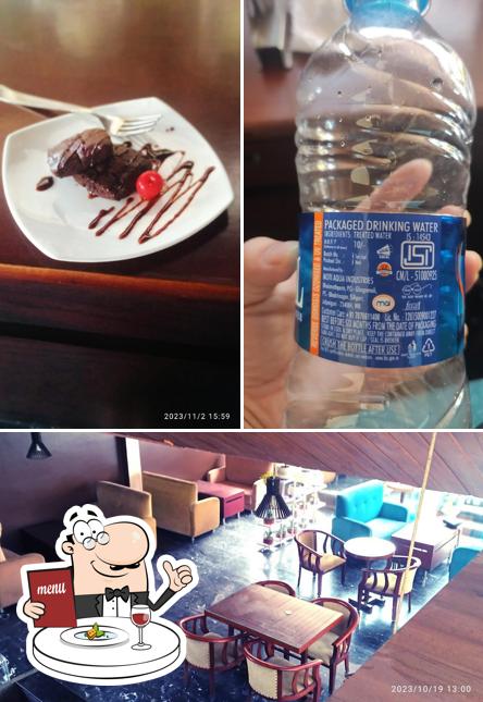 Check out the picture displaying food and interior at Cafe 100