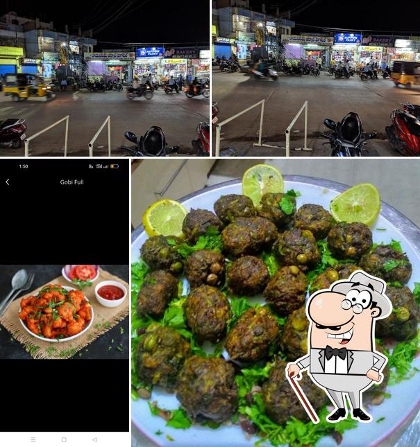 This is the image displaying exterior and food at Ambica Gobi Center