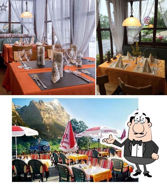 Siediti a un tavolo di Hotel-Restaurant Blümlisalp Grindelwald