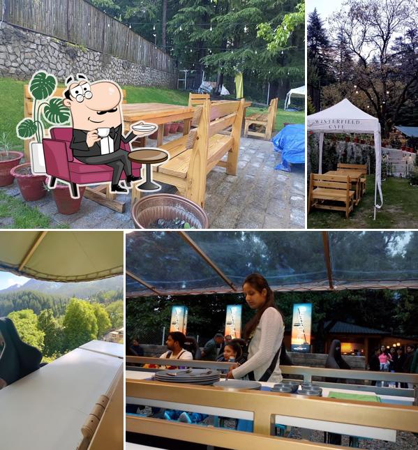 Take a seat at one of the tables at Flydining Manali