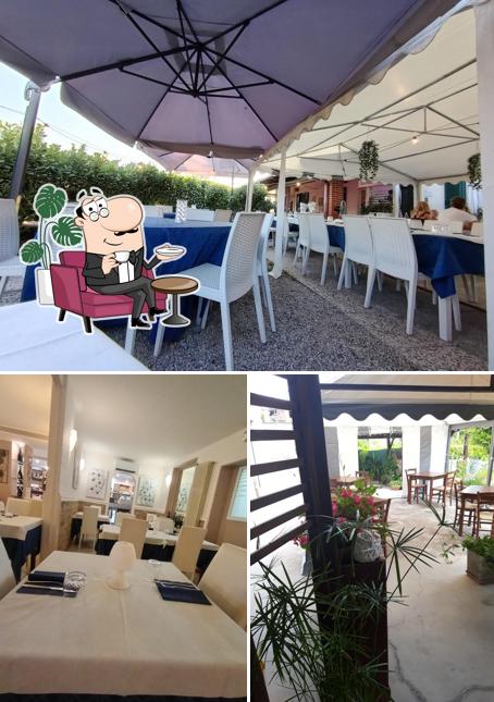 Dai un'occhiata agli interni di Pizzeria Ristorante Locanda Luna Rossa